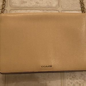 Light brown coach bag like new with gold accented strap